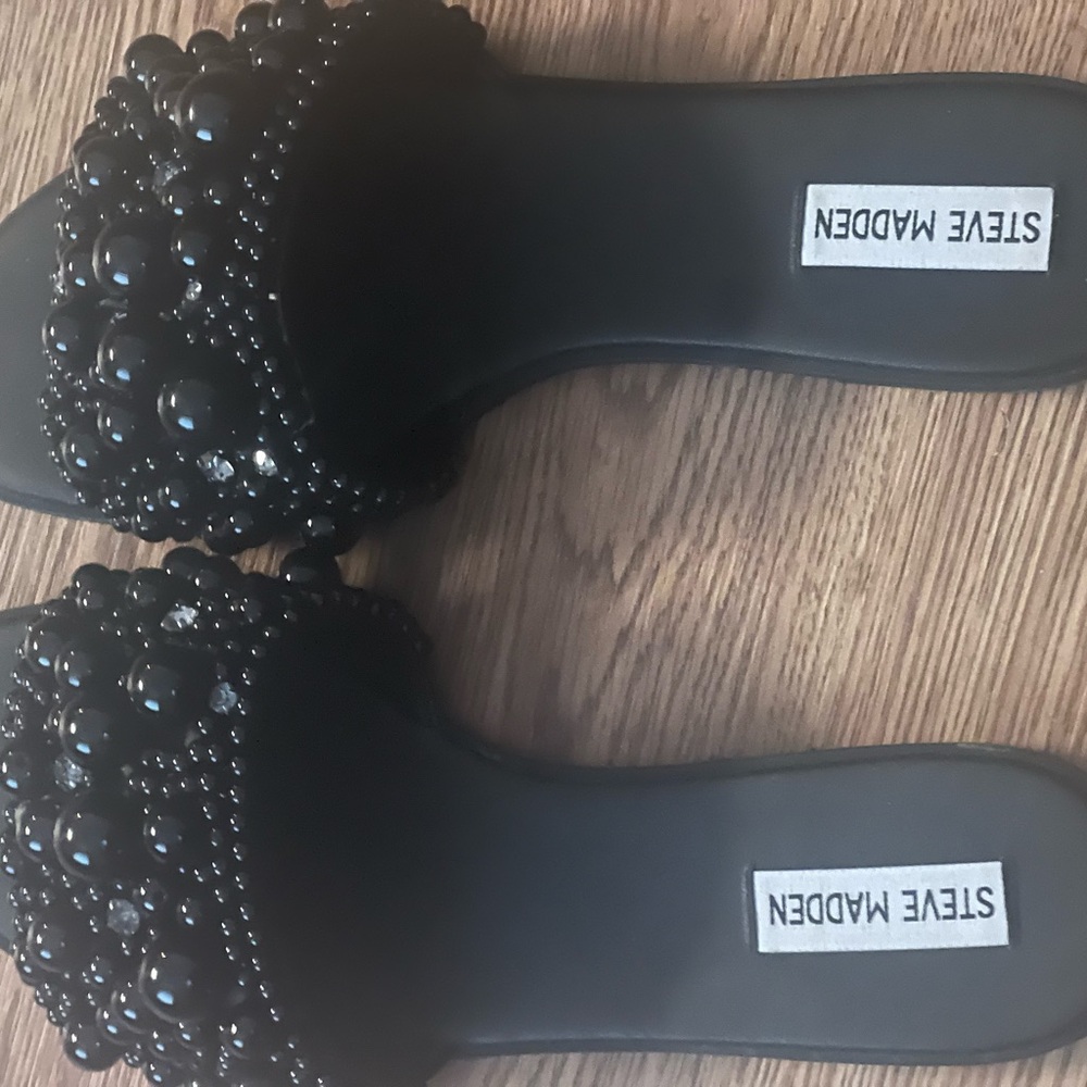 Steve Madden slides.